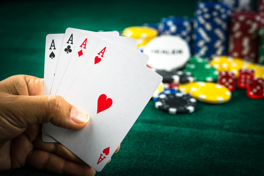 4 cartes de AS au poker